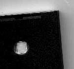 Underside of EPROM showing window to allow UV light to erase the pack.